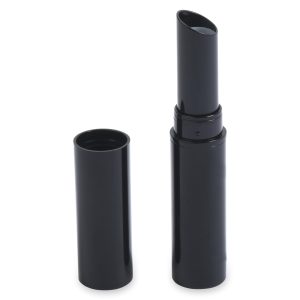 The Round Lipstick, featuring a sleek and modern design, showcases its lighter-colored lipstick inside a black cylinder-shaped case with the cap removed. The cylindrical cap, standing upright next to the open product, complements the overall aesthetic.