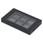A "6 Well Rectangular Compact" in black, featuring a transparent glass top cover. The top-angle view reveals its six empty compartments and a side handle on the right.