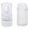 An airless pump bottle with the pump top removed and placed beside it. A clear cap is on the pump dispenser.